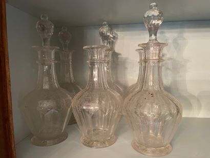 Set of six faceted and cut crystal decanters
With...