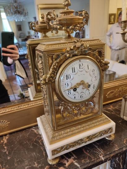 Clock In chased and gilt bronze, and white...