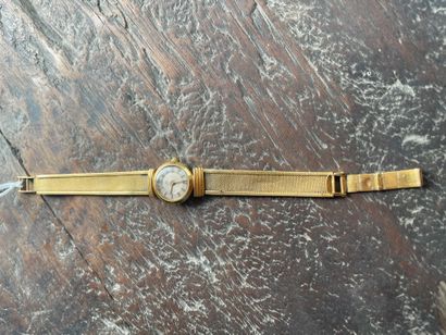 REXA lady's watch bracelet In gold 750°/°°
Round...