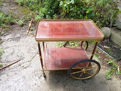 
Servant table 

In stained wood and brass...