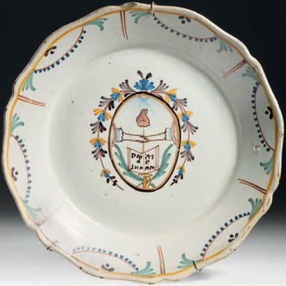 Earthenware plate with polychrome decoration...