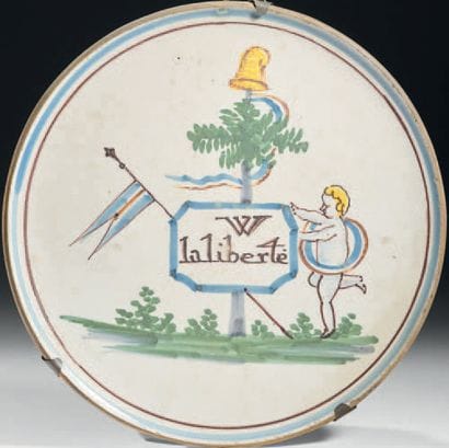 Earthenware medallion with polychrome decoration...