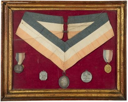 Frame containing a badge of office of the...