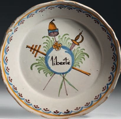 Earthenware plate with polychrome decoration...