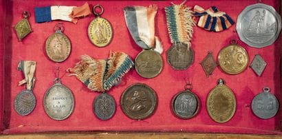 Display case containing 16 badges of judges,...