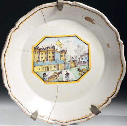 Earthenware plate with polychrome decoration...