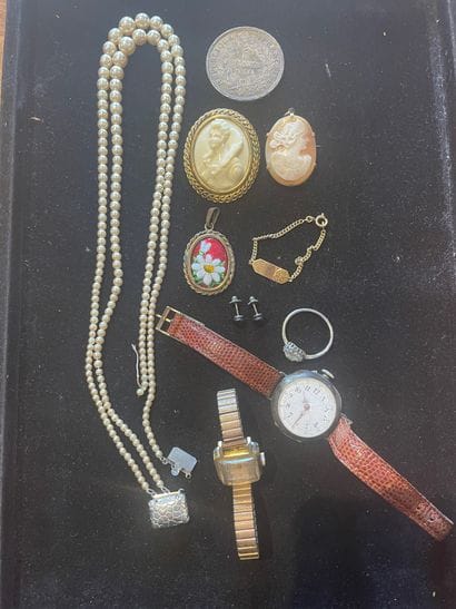 Lot of costume jewelry including
Two watches,...