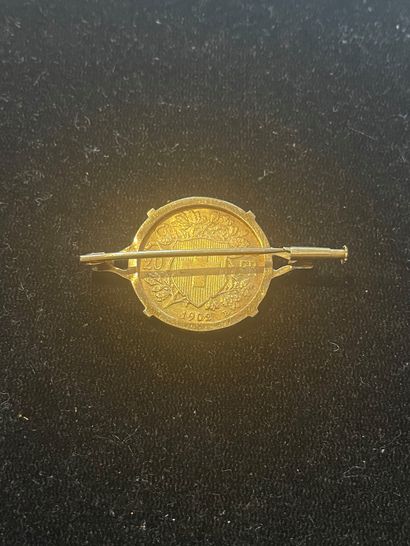 Gold brooch with a 20 F Swiss coin, 1902
P....