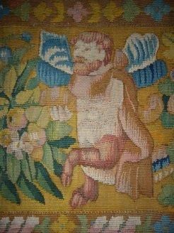 Bordure haute d'une tapisserie en laine....