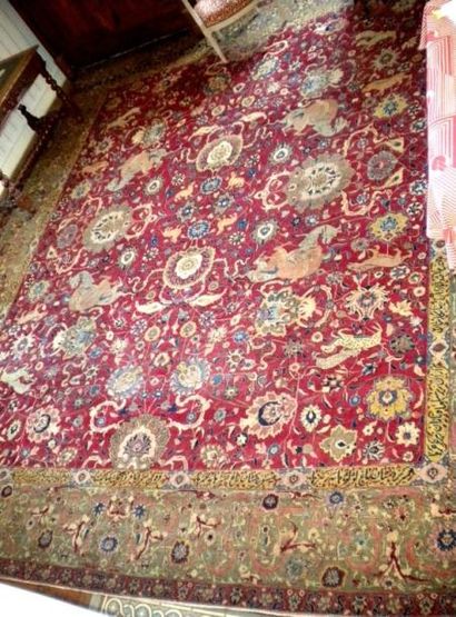 Superbe tapis en laine Tabriz. Fond rouge...