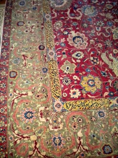 Superbe tapis en laine Tabriz. Fond rouge...