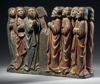 Double-sided walnut group carved in the round,...