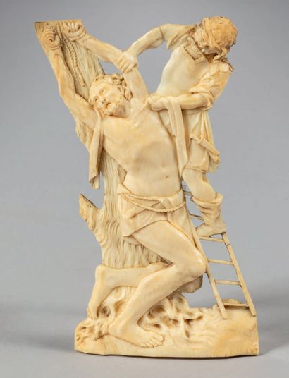 Ivory plaque carved in bas-relief and openwork...
