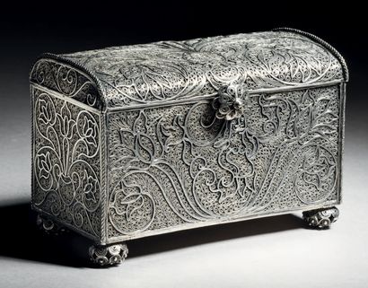Rectangular filigree silver box with slightly...