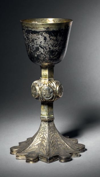 Embossed, engraved and mostly gilded silver...
