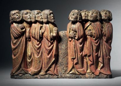Double-sided walnut group carved in the round,...