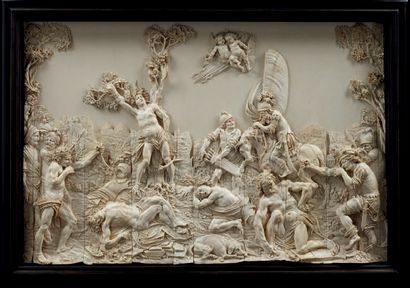 Ivory plaque carved in bas-relief and openwork...