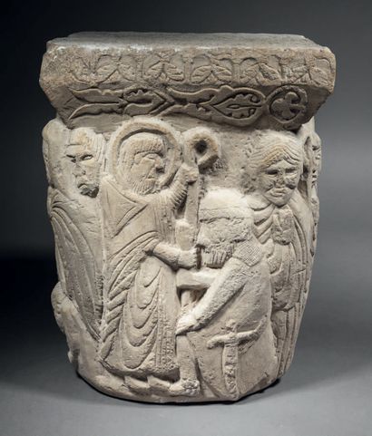 Carved limestone capital historiated on all...