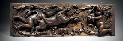 Two walnut panels from the same suite, carved...