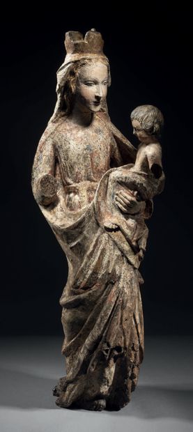 Virgin and Child in carved wood (walnut?),...