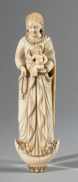 Virgin and Child in ivory, finely carved...