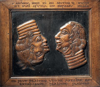 Panneau satirique en noyer sculpté en bas-relief...