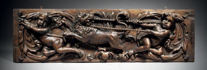Two walnut panels from the same suite, carved...