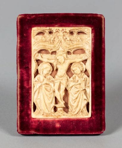 Carved ivory plaque depicting the Crucifixion...