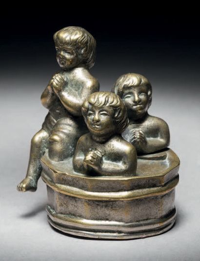 Three children in a silver-plated bronze...