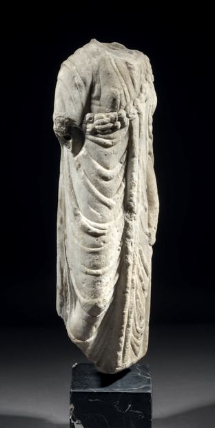Statue of an acephalous woman in marble carved...