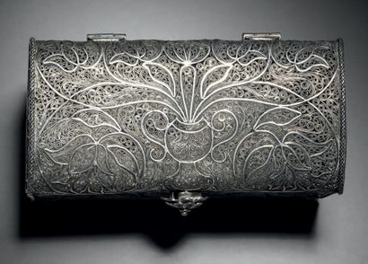 Rectangular filigree silver box with slightly...