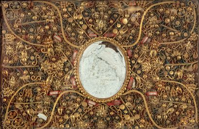 Red and blue rolled paper reliquary board...