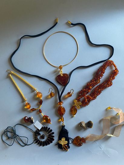 Amber, resin and imitation jewelry including...