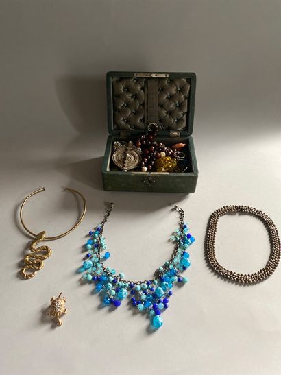 Lot of costume jewelry in two jewelry boxes,...