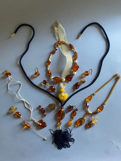 Amber, resin and imitation jewelry including...