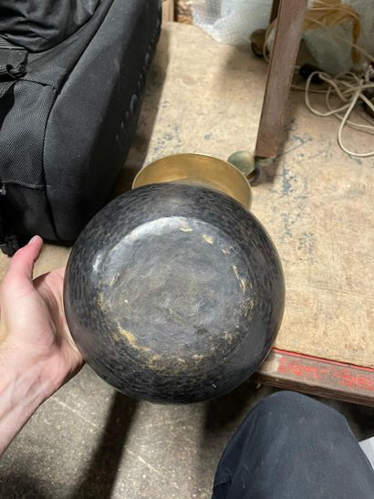 Set of one small and one large brass bowl,...