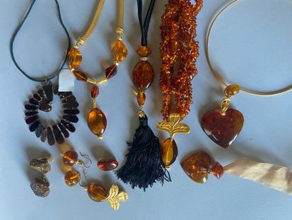 Amber, resin and imitation jewelry including...