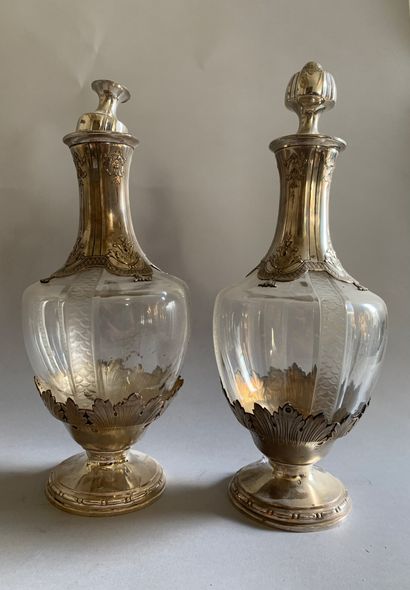 Pair of baluster carafes in cut crystal and...