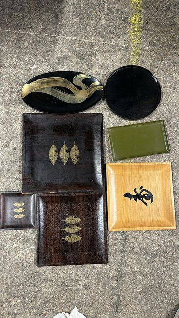 Set of seven wood or lacquer trays