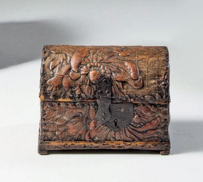 Box with domed lid covered in embossed leather...