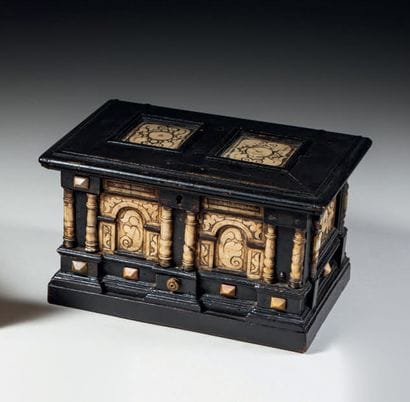 Blackened wood case with alabaster plaques...