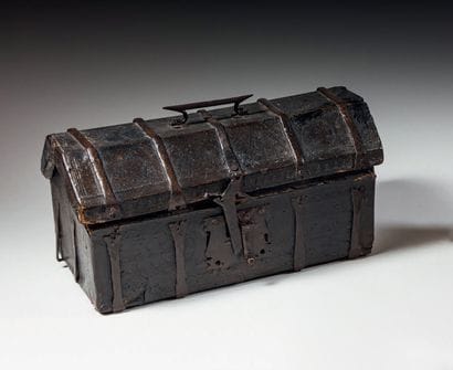 Large chest with flanged lid, wooden core...