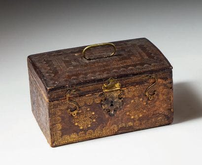 Gilded leather case decorated with friezes...