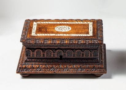 Small walnut box carved with palmettes and...