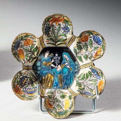 Polychrome painted enamel cup depicting the...