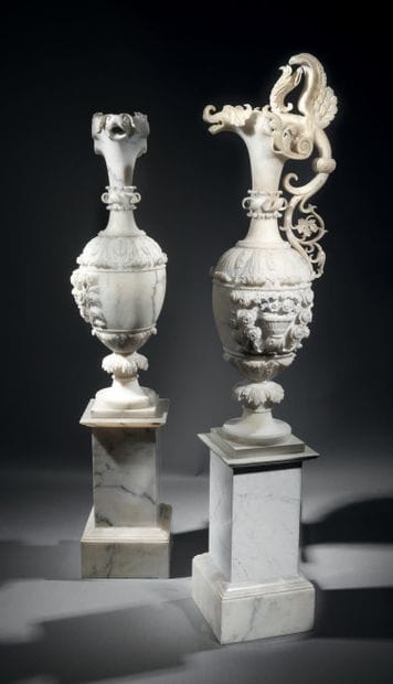 Pair of large decorative ewers in richly...