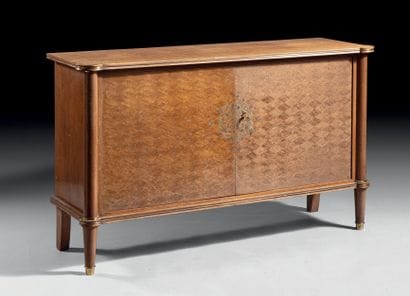 Jules LELEU (1883-1961)
Blond mahogany veneered...
