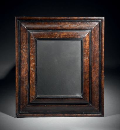 Rectangular mirror in walnut veneer. Frame...
