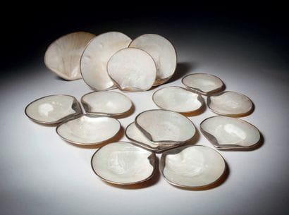 Set of fifteen different-sized mother-of-pearl...