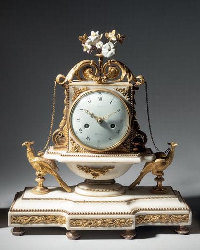 Boundary clock in white marble with rich...